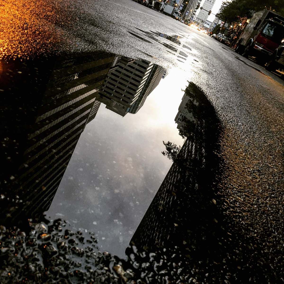 1800 arch st building reflecting on water during daytime philadelphia